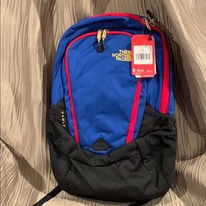 Blue, Red, & Black North Face Back Pack